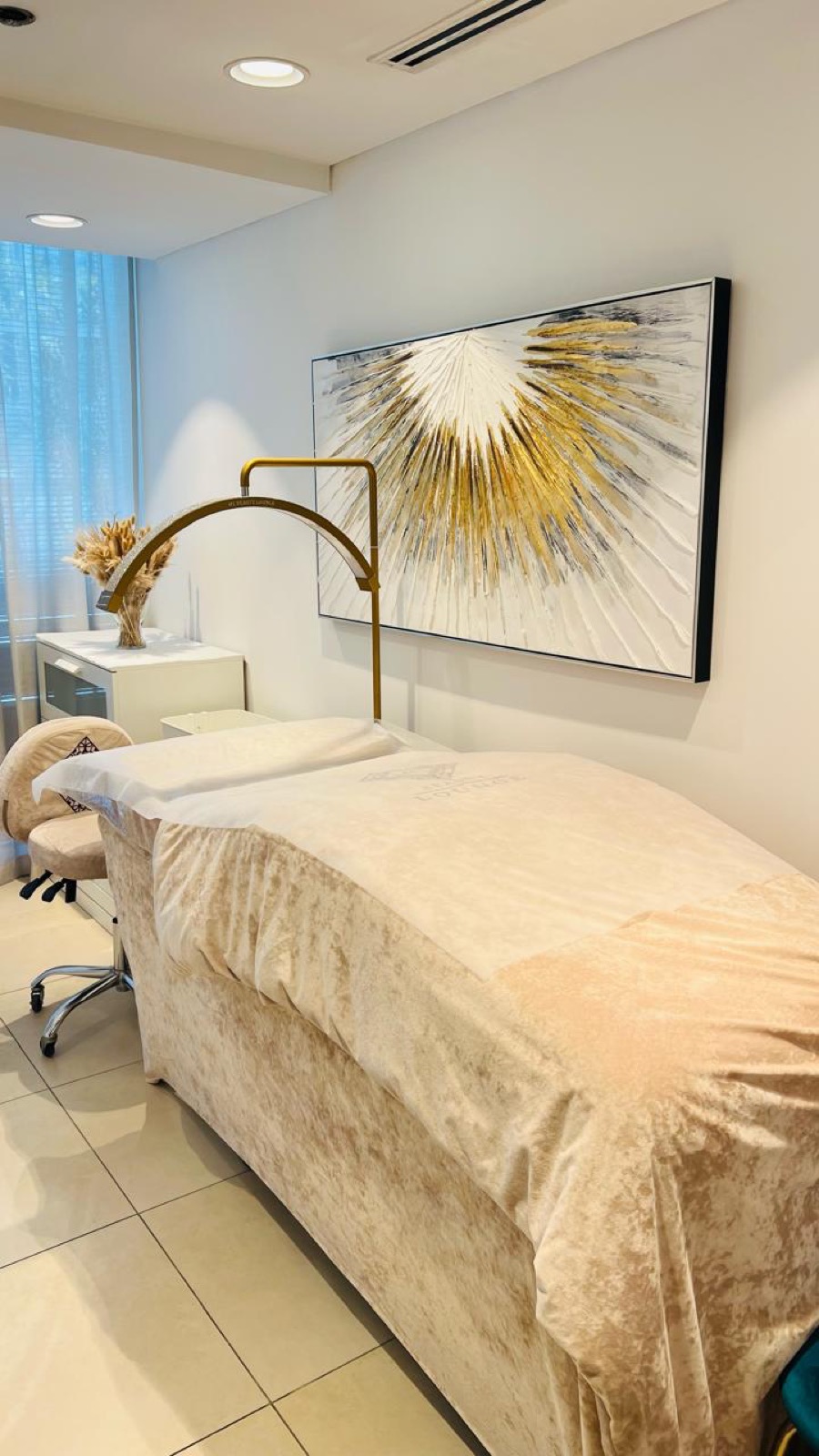 Cleansing facial treatment being performed at MC Beauty Lounge JLT Dubai